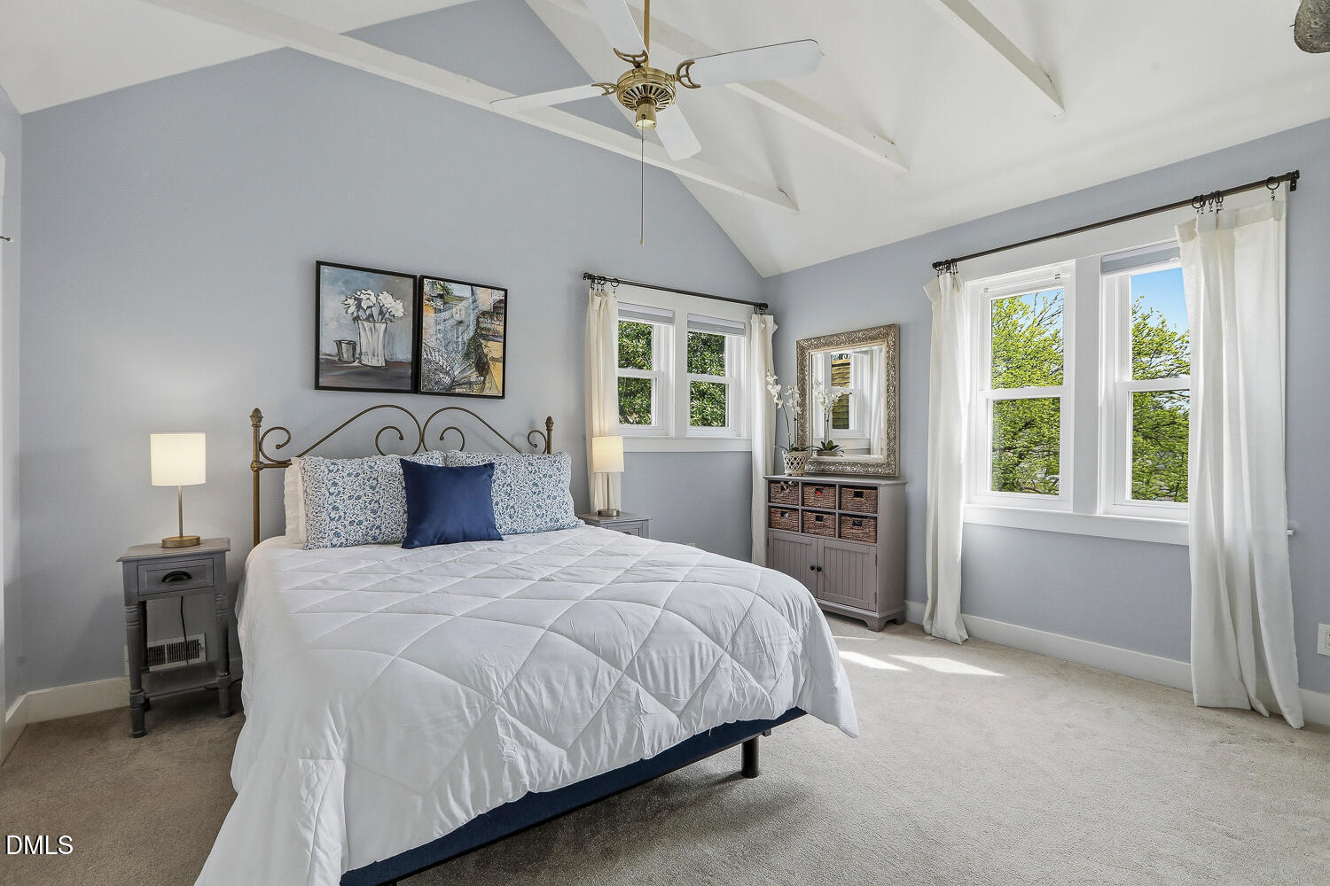 6023 Sentinel Drive Raleigh, NC 27609 - Photo 31 of 53 a bedroom with a large bed and a window