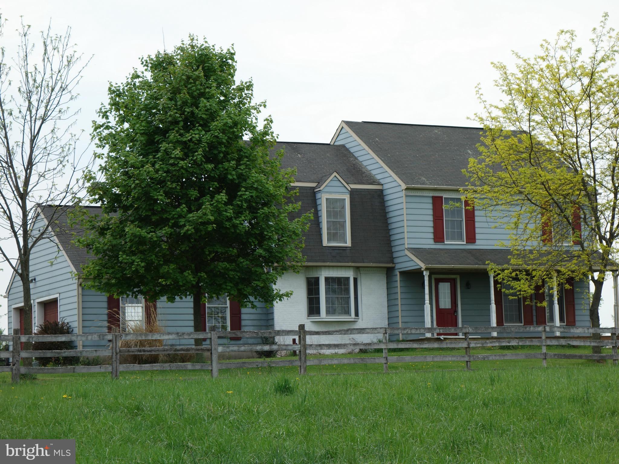 7235 Keysville Road Keymar, MD 21757 - Photo 1 of 21 front view of a brick house with a yard