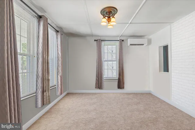 a view of a livingroom with a window
