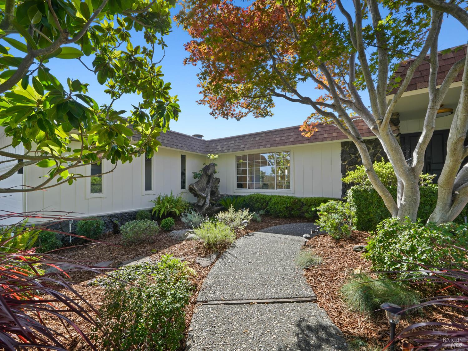 148 Dominican Drive San Rafael, CA 94901 - Photo 4 of 60 a front view of a house with garden