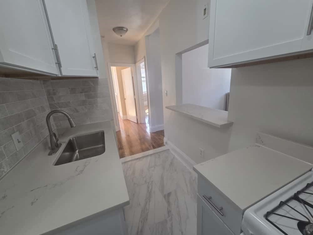 100 St Marys Street, Unit 1 Boston, MA 02215 - Photo 6 of 12 a view of storage and utility room with a sink