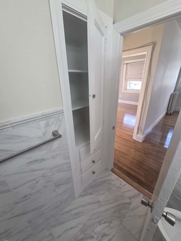 100 St Marys Street, Unit 1 Boston, MA 02215 - Photo 10 of 12 wooden floor in an empty room