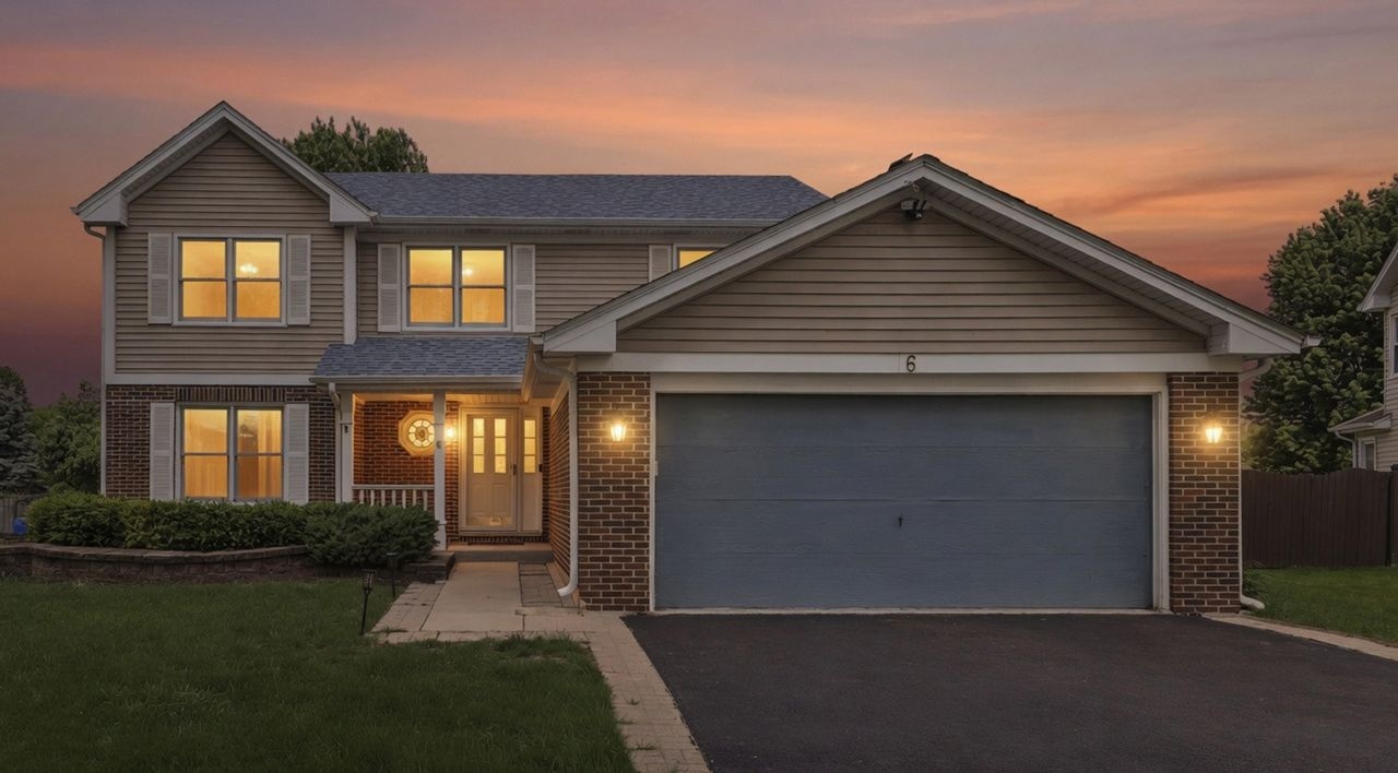 6 Boulder Ridge Court Bolingbrook, IL 60490 - Photo 4 of 4 a front view of a house with garden