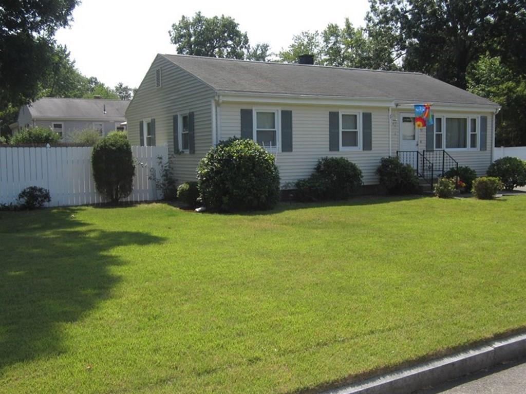 97 Fallston Street Springfield, MA 01119 - Photo 1 of 35 a view of a house with a yard and garage