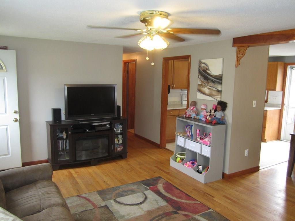 97 Fallston Street Springfield, MA 01119 - Photo 11 of 35 a living room with furniture and a flat screen tv