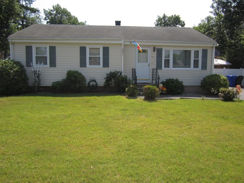 97 Fallston Street Springfield, MA 01119 - Photo 2 of 35 a front view of a house with garden and porch