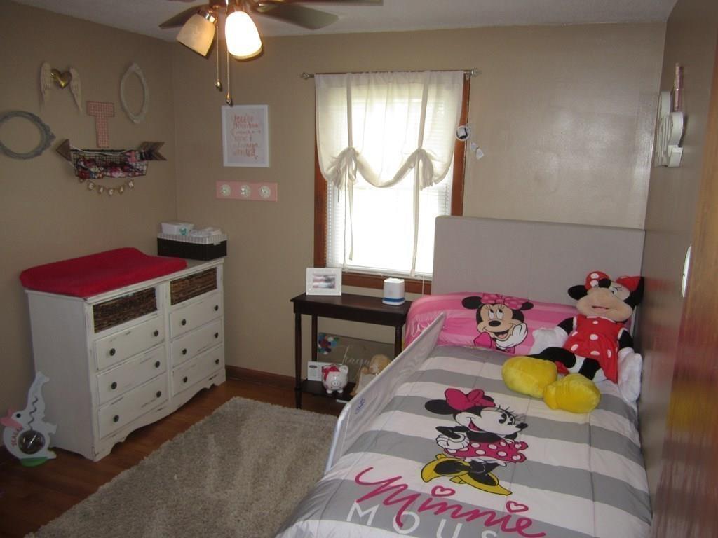 97 Fallston Street Springfield, MA 01119 - Photo 21 of 35 a bedroom with a bed and a dresser