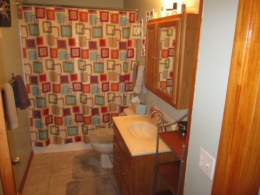 97 Fallston Street Springfield, MA 01119 - Photo 23 of 35 a bathroom with a bathtub and shower