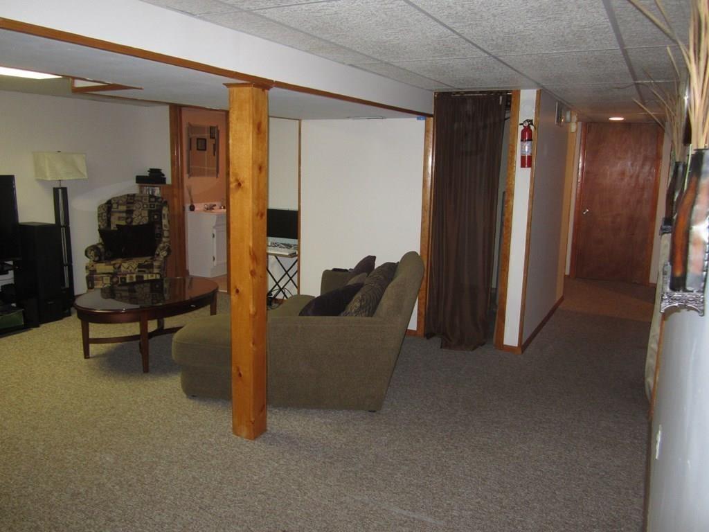 97 Fallston Street Springfield, MA 01119 - Photo 27 of 35 a living room with furniture and a wooden floor
