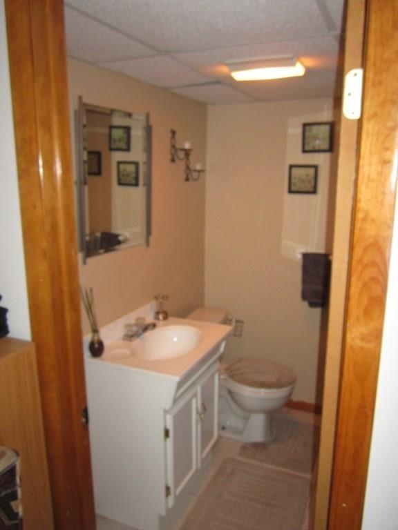97 Fallston Street Springfield, MA 01119 - Photo 28 of 35 a bathroom with a sink and mirror with toilet