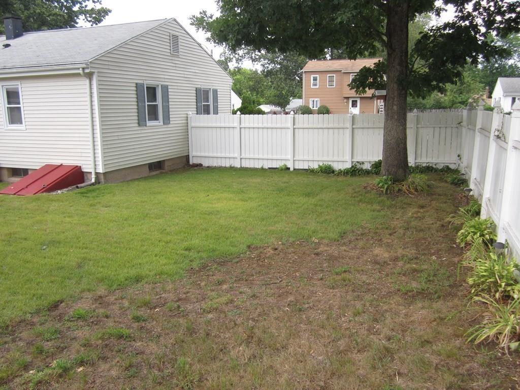 97 Fallston Street Springfield, MA 01119 - Photo 30 of 35 a view of a house with a backyard