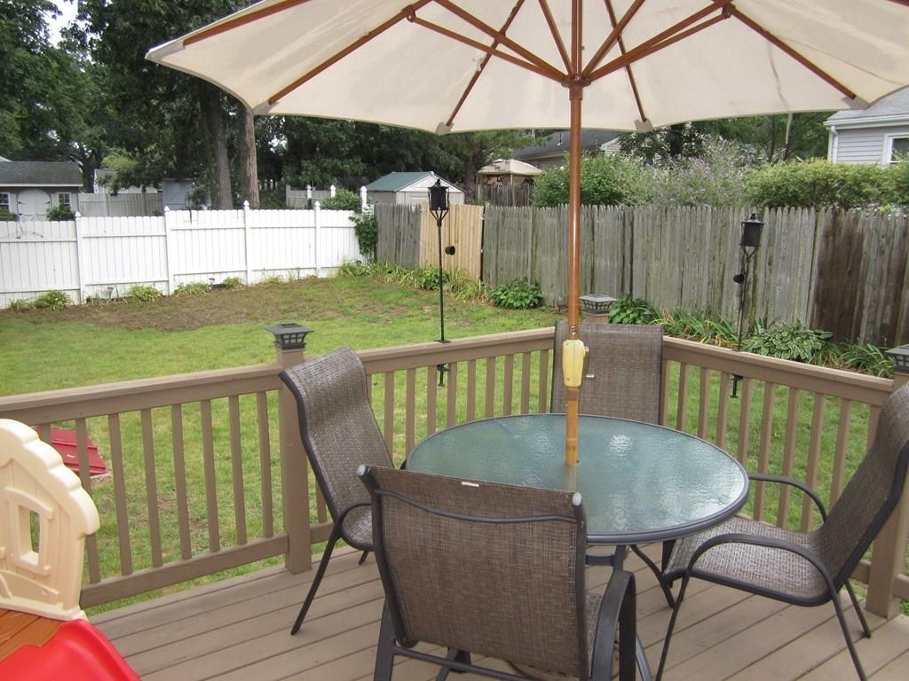 97 Fallston Street Springfield, MA 01119 - Photo 31 of 35 a view of a chair and table on the deck
