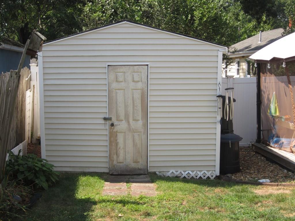97 Fallston Street Springfield, MA 01119 - Photo 32 of 35 a front view of a house with garage