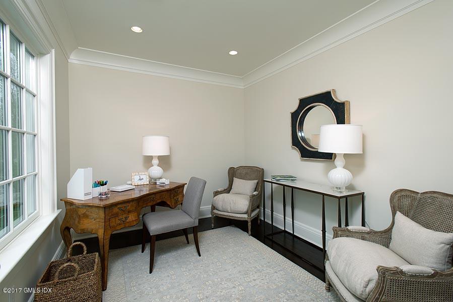 1 Doverton Drive Greenwich, CT 06831 - Photo 21 of 34 a living room with furniture and a potted plant