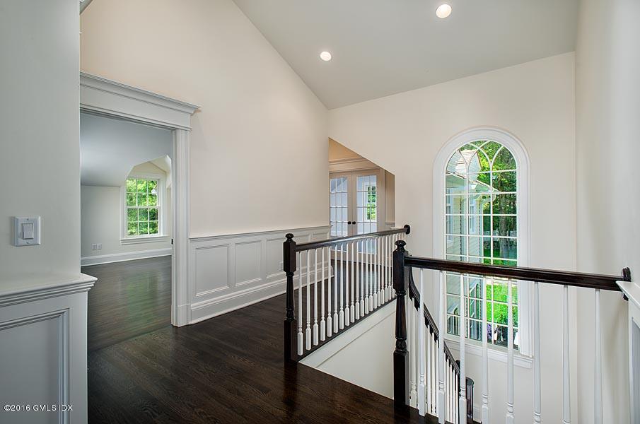 1 Doverton Drive Greenwich, CT 06831 - Photo 24 of 34 a view of an entryway with wooden floor door and windows