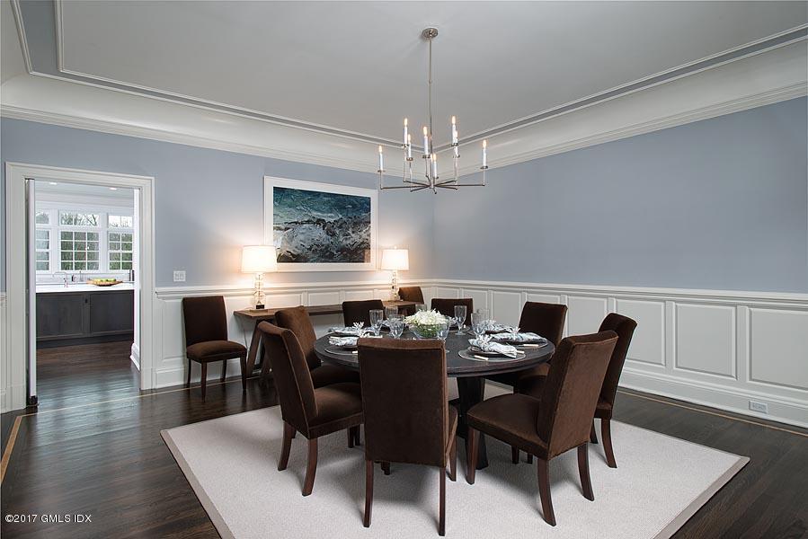 1 Doverton Drive Greenwich, CT 06831 - Photo 10 of 34 a view of a dining room with furniture window and wooden floor