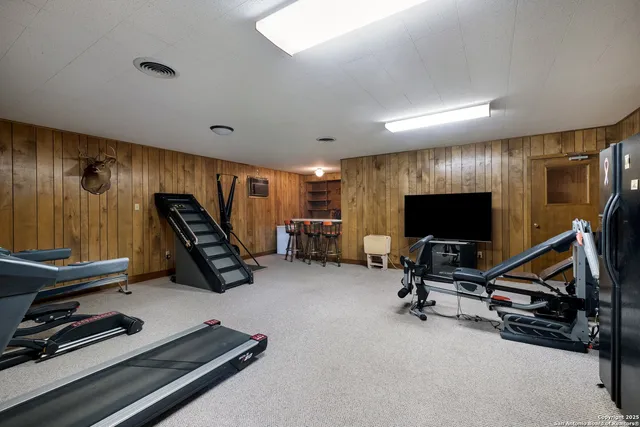 a view of a room with gym equipment