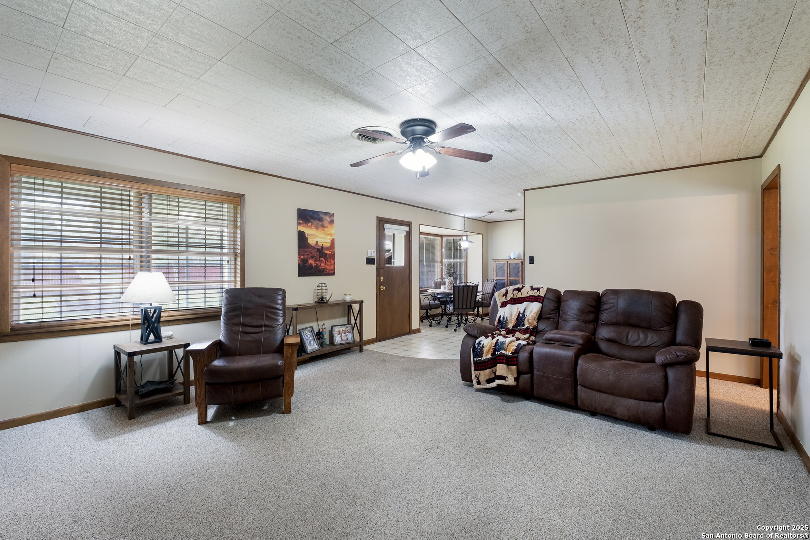 1109 27th Street Hondo, TX 78861 - Photo 3 of 21 a living room with furniture and a large window