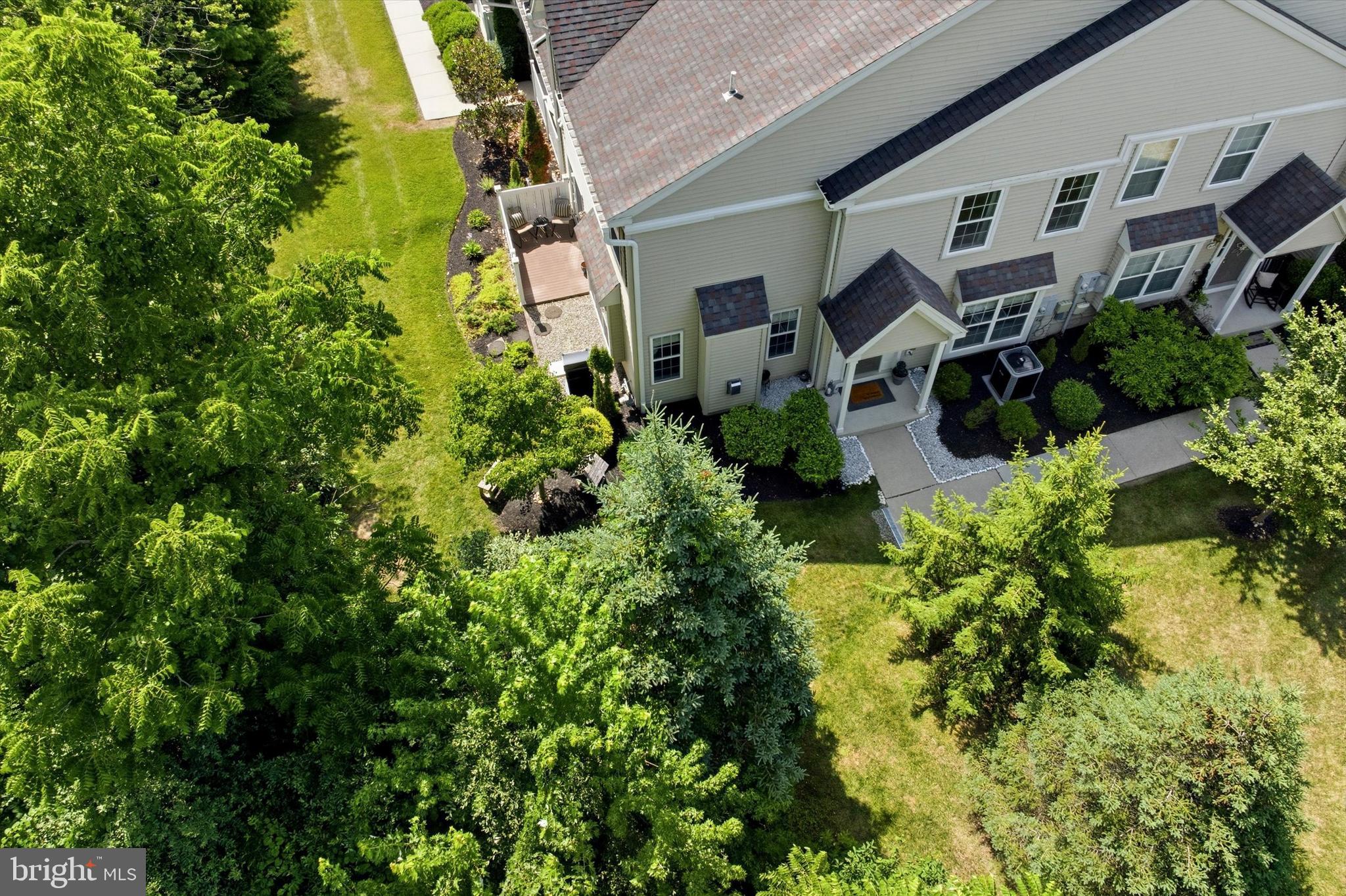 215 Flagstone Road, Unit 1 Chester Springs, PA 19425 - Photo 29 of 33 an aerial view of a house with a yard