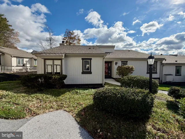 a view of a house with a garden