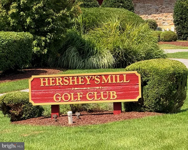 a outdoor view with a sign board