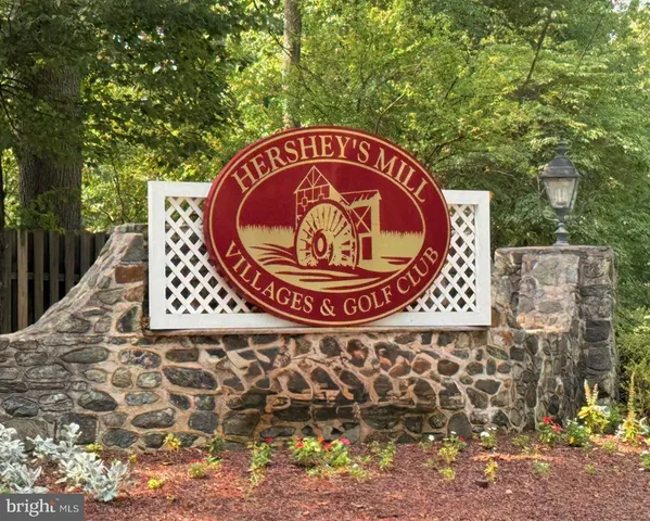 a sign that is on the side of a tree