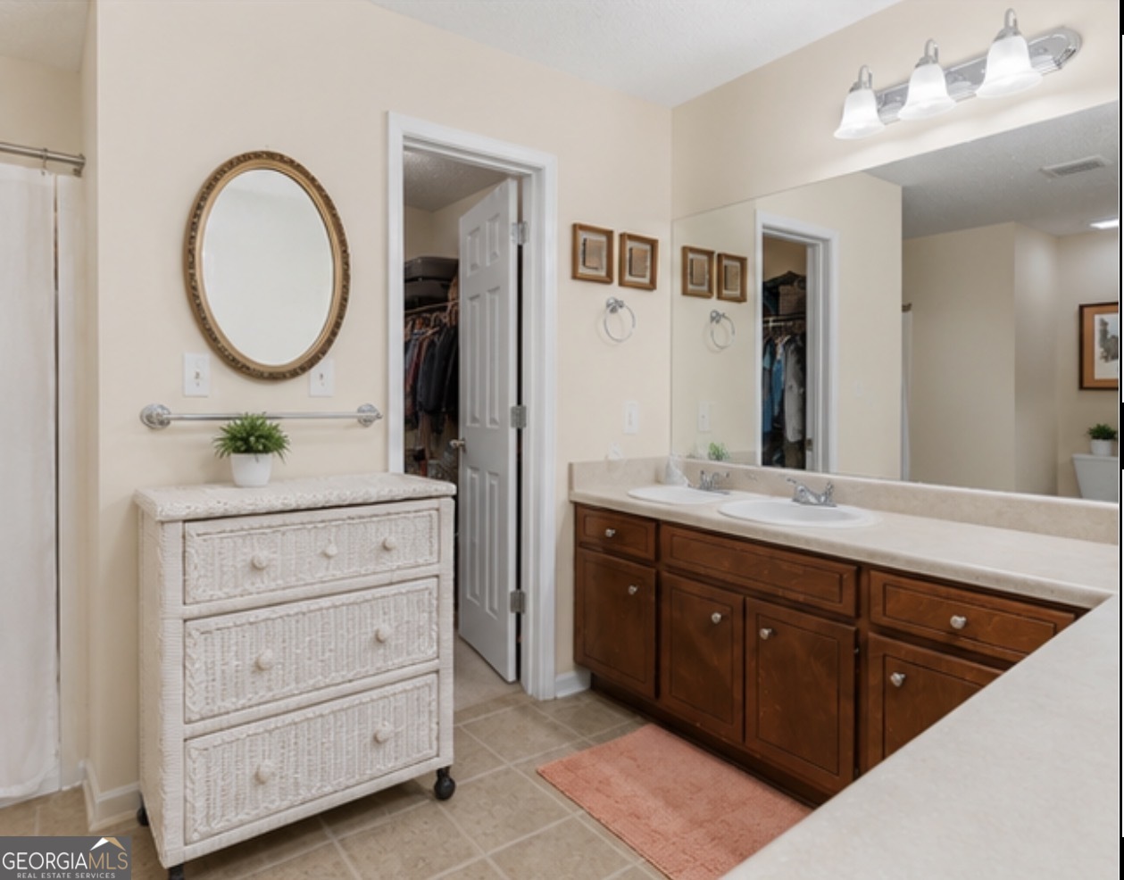 138 Brookfair Lane Leesburg, GA 31763 - Photo 21 of 30 a bathroom with a granite countertop sink mirror and bathtub
