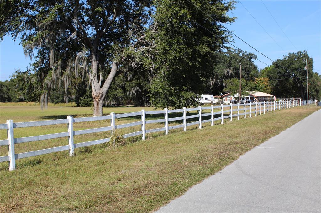 2755 Taylor Road Auburndale, FL 33823 - Photo 13 of 86 a view of a yard with wooden fence