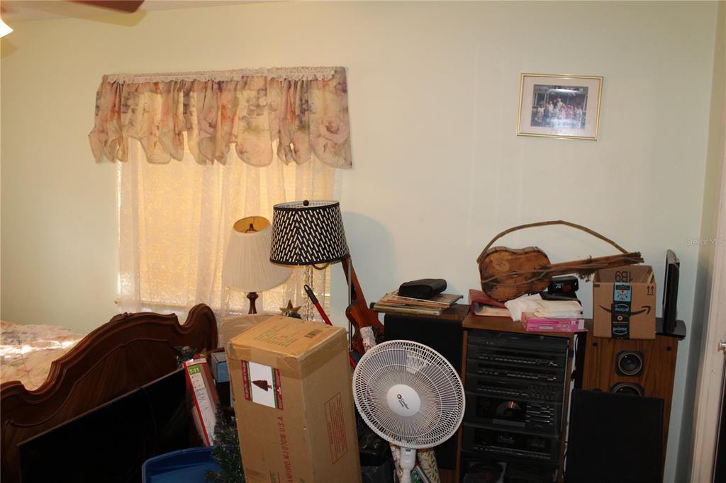 2755 Taylor Road Auburndale, FL 33823 - Photo 50 of 86 a bed room with furniture and a window