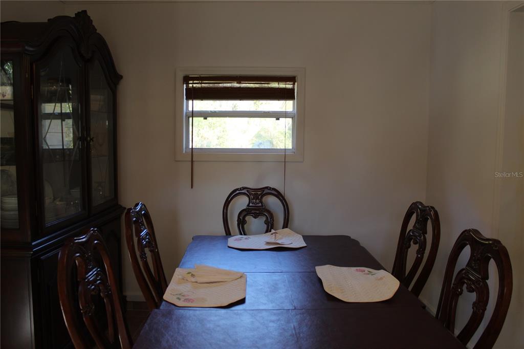 2755 Taylor Road Auburndale, FL 33823 - Photo 58 of 86 a bathroom with a sink toilet and mirror