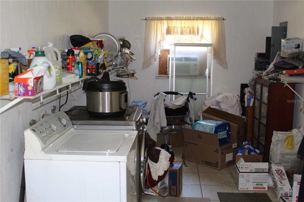 2755 Taylor Road Auburndale, FL 33823 - Photo 79 of 86 a view of a room with gym equipment