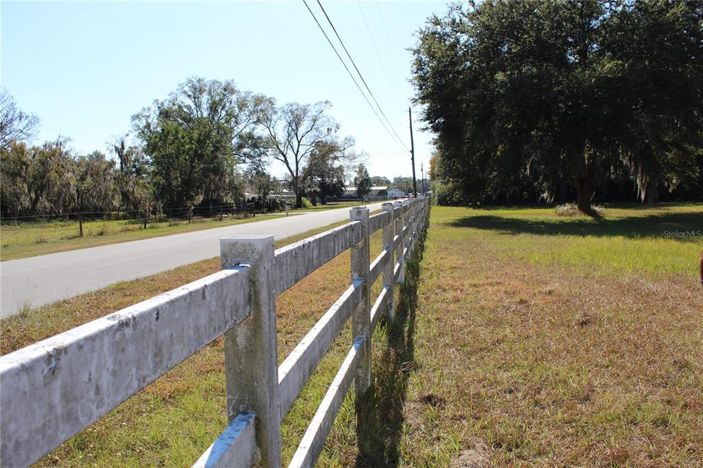2755 Taylor Road Auburndale, FL 33823 - Photo 8 of 86 a view of a swimming pool with a yard