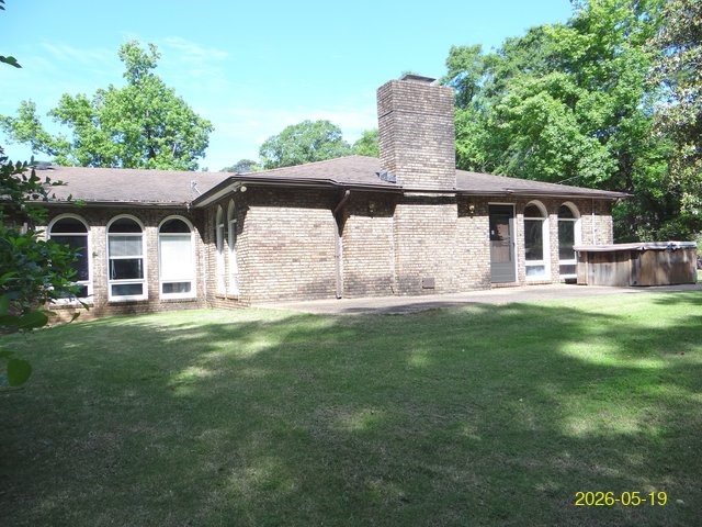 6730 Ranch Forest Drive Columbus, GA 31904 - Photo 3 of 17 a front view of a house with a garden