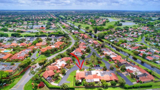 a view of a pathway of a wooden fence