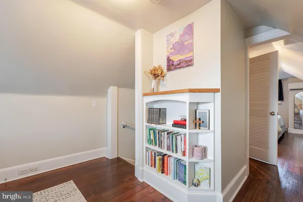 a view of a house with a snow in the yard