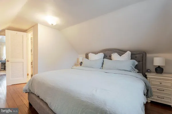 a view of a house with swimming pool and a yard