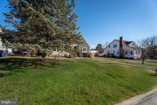 a view of a balcony with chairs