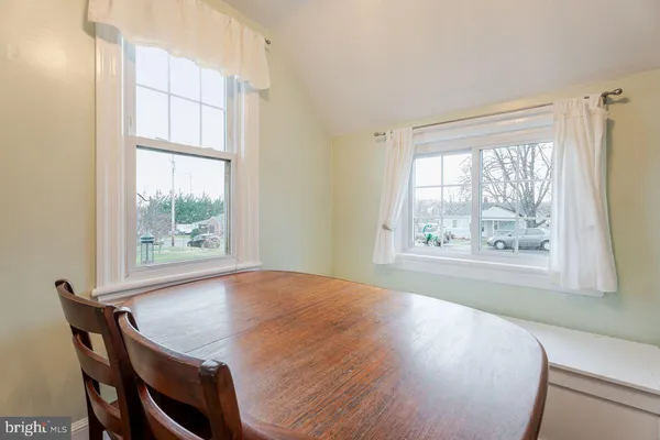a kitchen with stainless steel appliances a refrigerator sink and cabinets