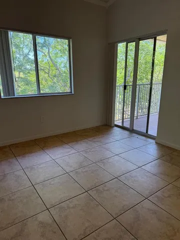 a kitchen with cabinets and appliances