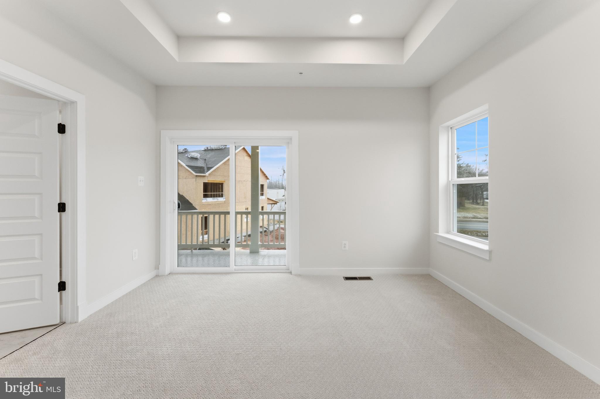19110 Tatie Way Poolesville, MD 20837 - Photo 12 of 29 an empty room with windows and closet