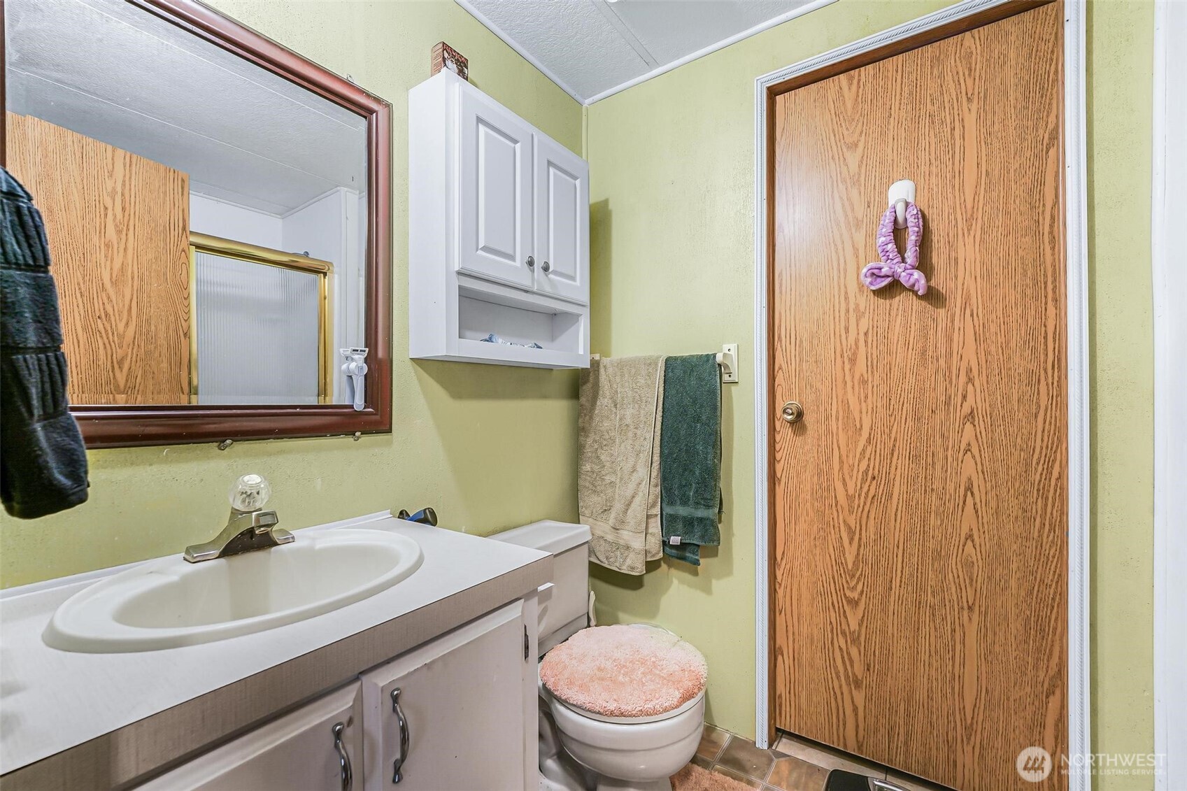 980 South Falcon Road Camano Island, WA 98282 - Photo 19 of 30 a bathroom with a sink toilet and shower