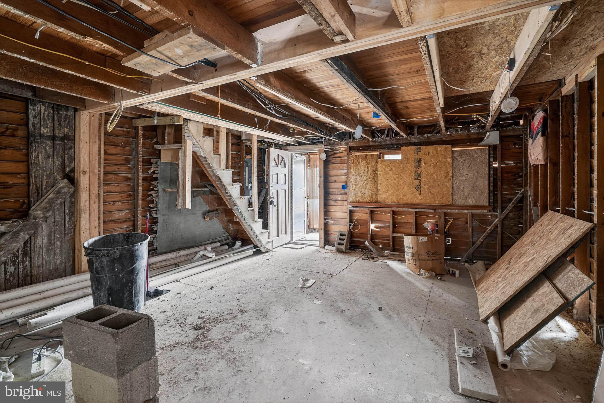 626 Douglas Street Cambridge, MD 21613 - Photo 6 of 15 a view of an empty room with wooden floor
