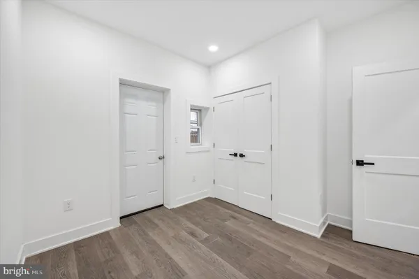 a view of an empty room with stairs