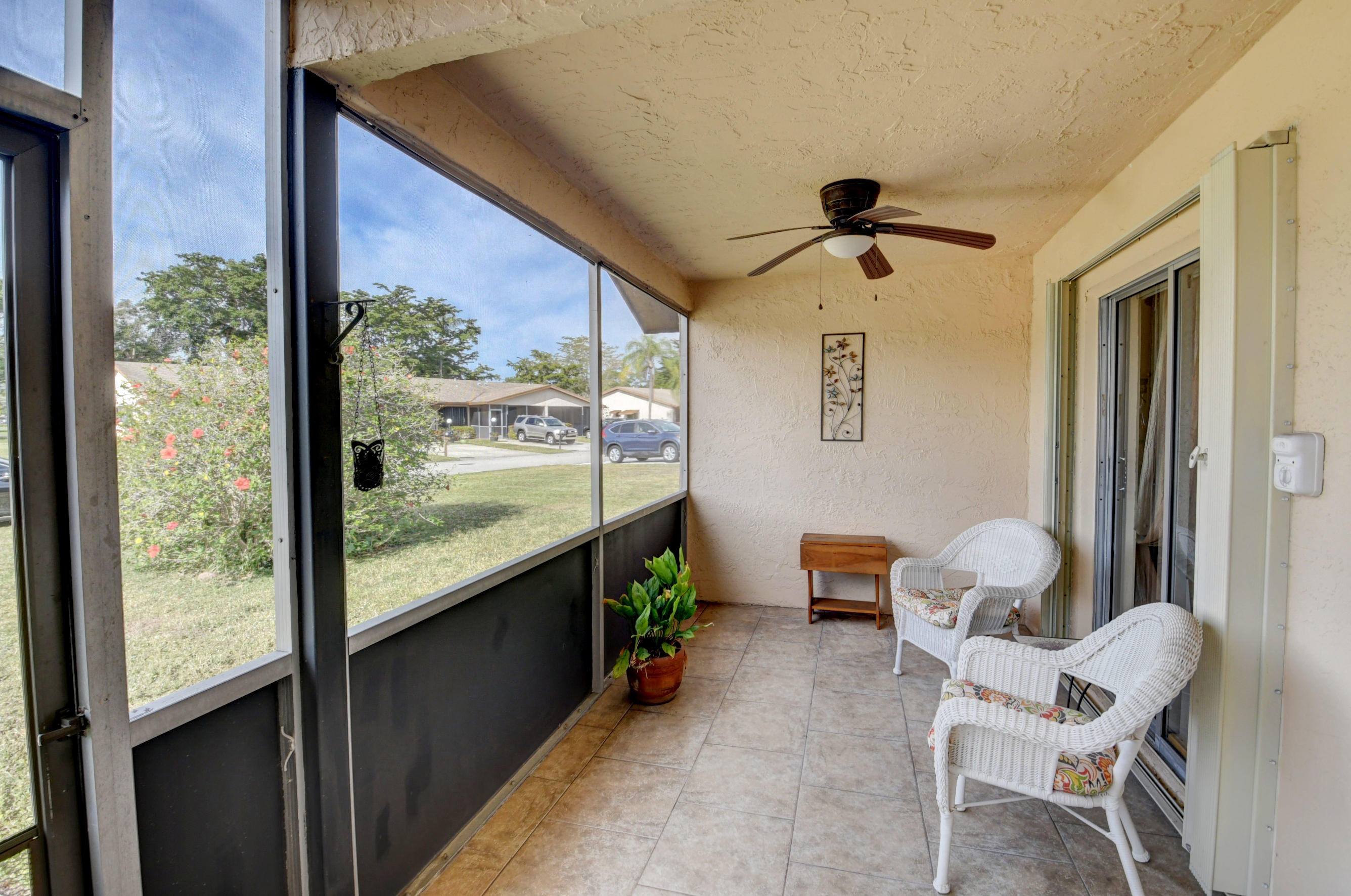 14626 Candy Way Delray Beach, FL 33484 - Photo 3 of 37 FRONT SCREENED PORCH ENTRANCE