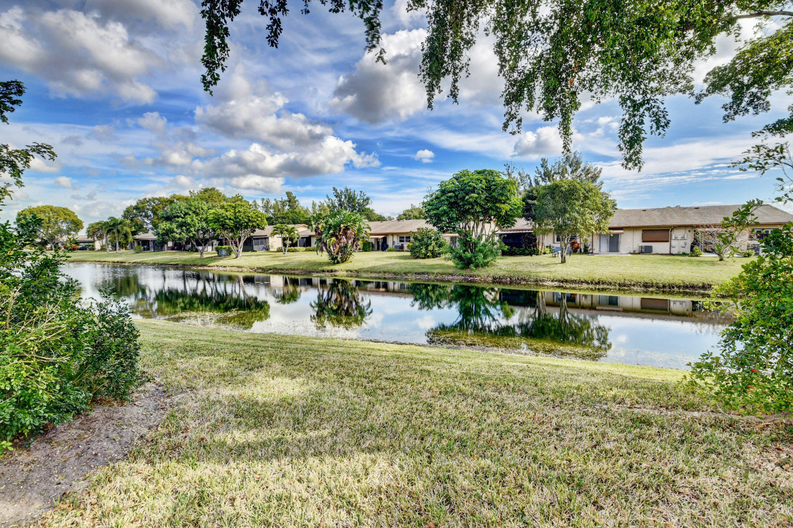 14626 Candy Way Delray Beach, FL 33484 - Photo 34 of 37 LAKE VIEW IN BACK PROVIDES PRIVACY...