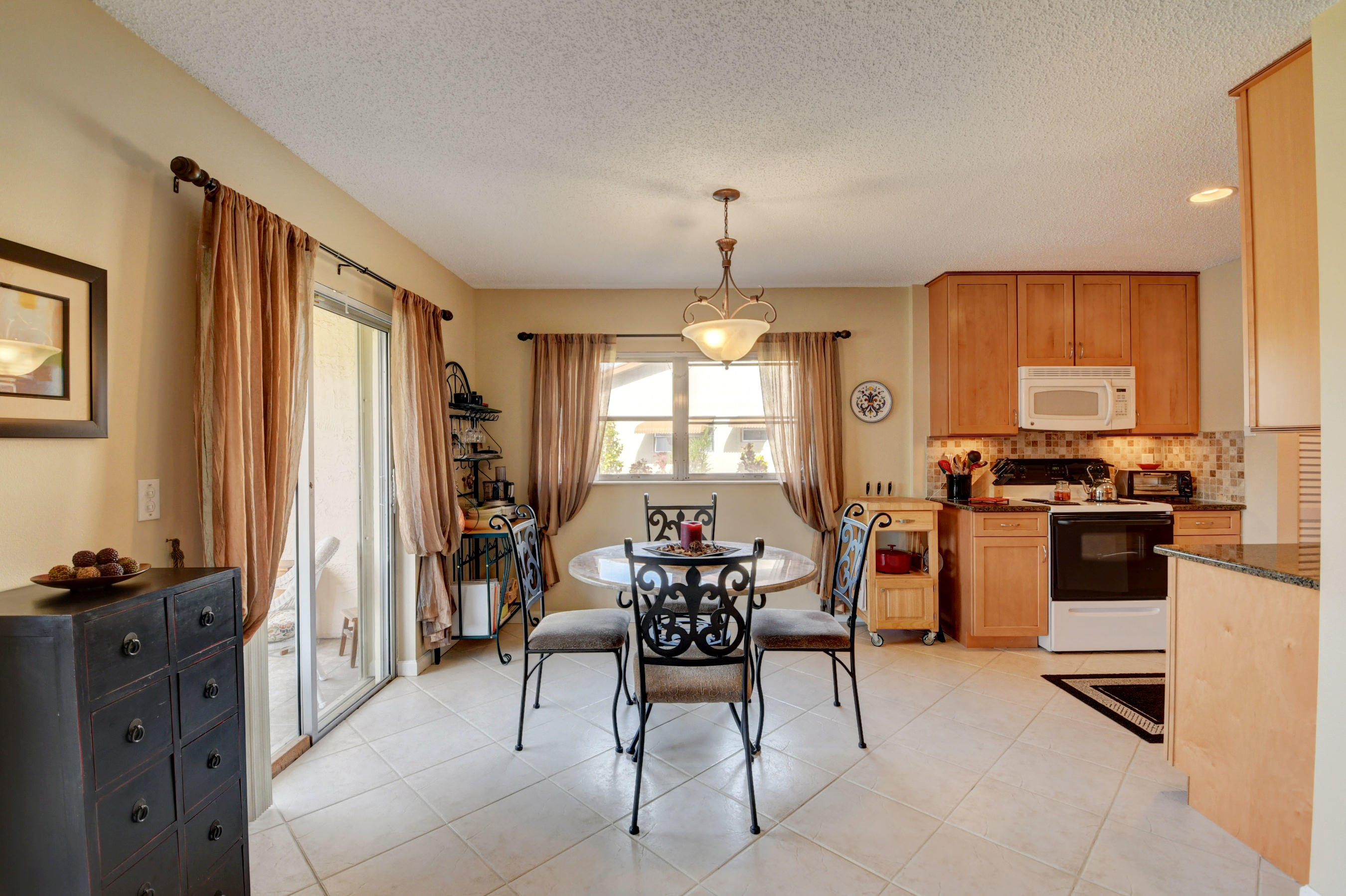 14626 Candy Way Delray Beach, FL 33484 - Photo 6 of 37 LIGHT AND BRIGHT DINING AREA...