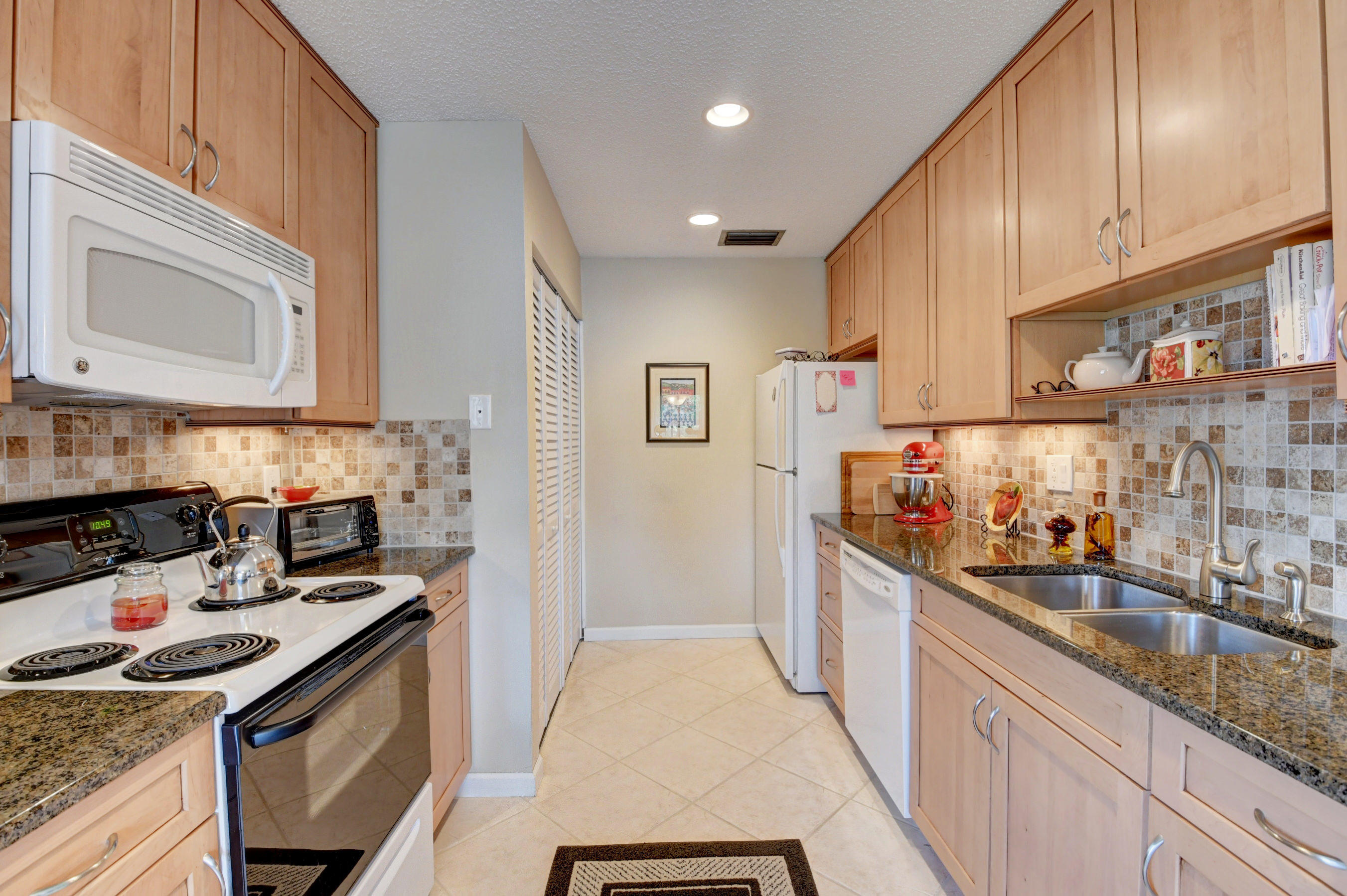 14626 Candy Way Delray Beach, FL 33484 - Photo 9 of 37 KITCHEN WITH 42" CABINETS...