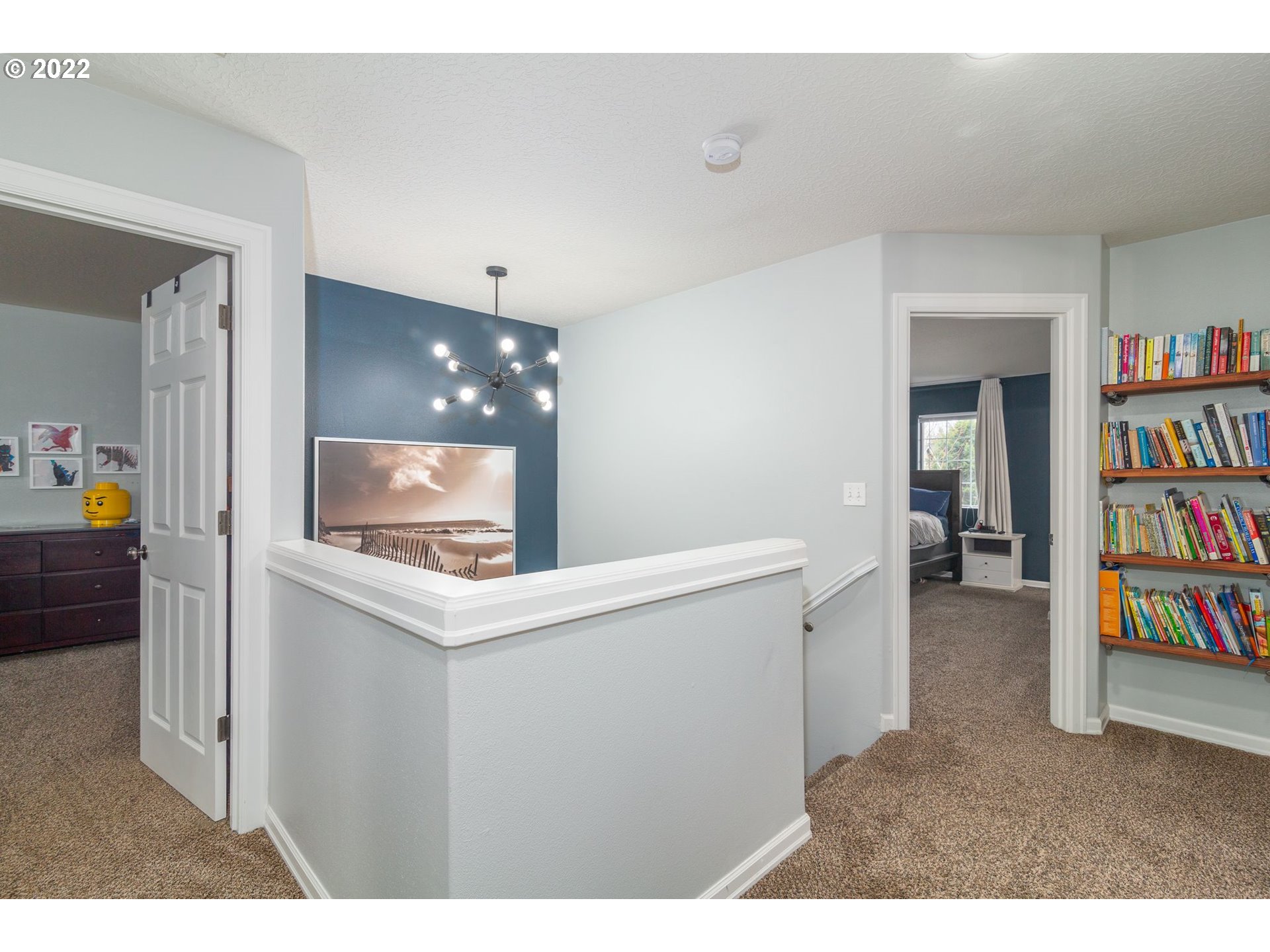 1310 Northeast 172nd Street Ridgefield, WA 98642 - Photo 14 of 32 a living room with furniture and a flat screen tv