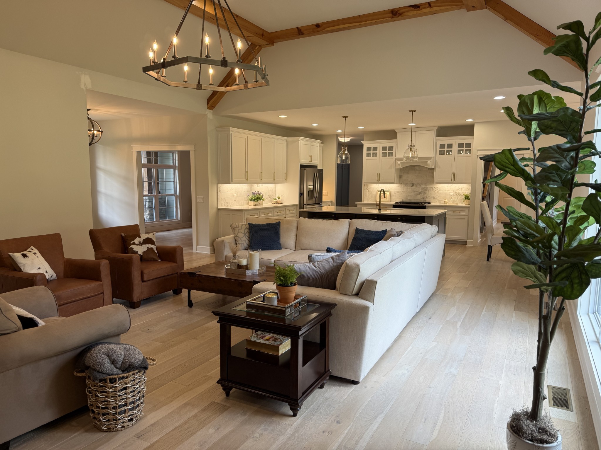 2145 Honey Prong Road Hartsville, TN 37074 - Photo 12 of 99 a living room with furniture kitchen view and a chandelier