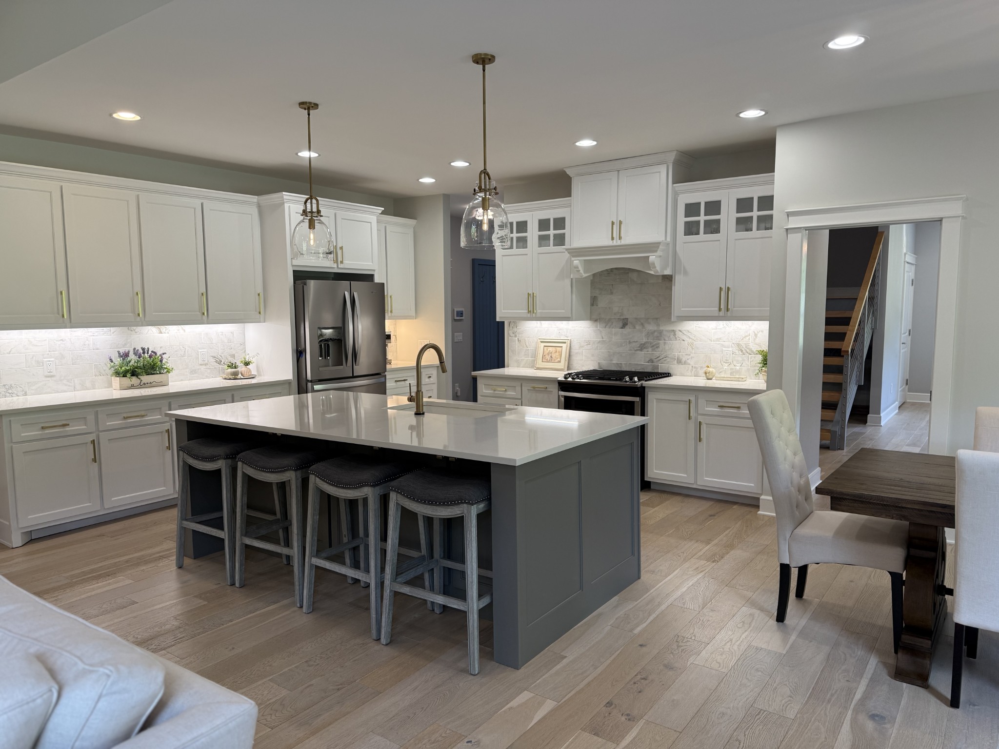 2145 Honey Prong Road Hartsville, TN 37074 - Photo 15 of 99 a kitchen with kitchen island granite countertop a sink a center island stainless steel appliances and cabinets